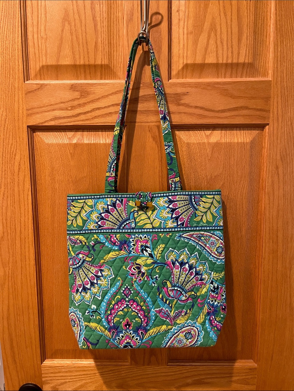 Vera Bradley  tote with three  section pocket and toggle closure